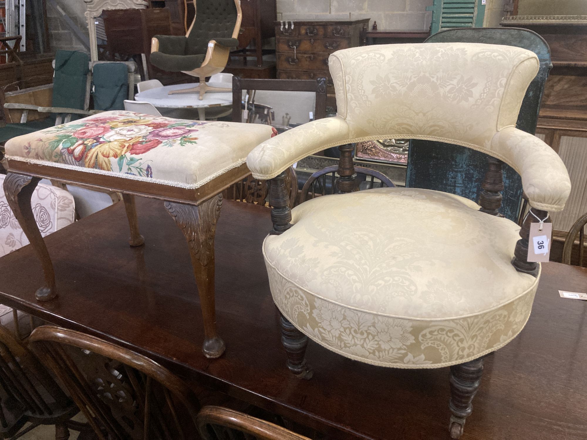 A late Victorian upholstered tub framed elbow chair, together a Queen Anne style dressing stool